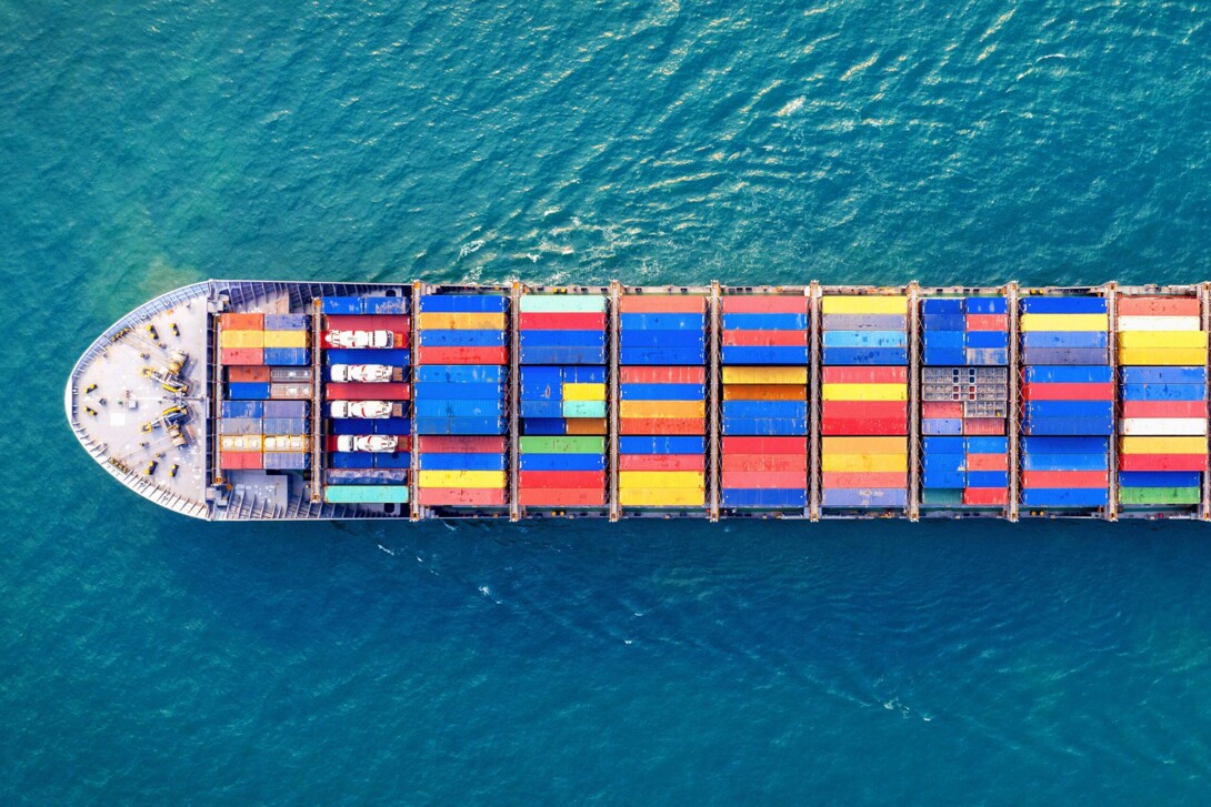 aerial-view-container-cargo-ship-sea-scaled